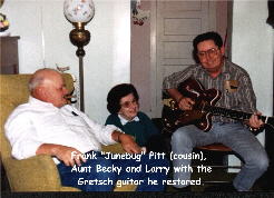 Frank "Junebug" Pitt (cousin), Aunt Becky and Larry with the Gretsch guitar he restored.